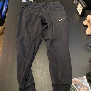 Men’s black Nike sweatpants size small.